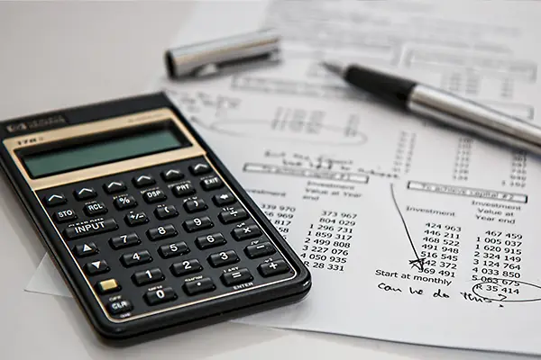 calculator and paperwork for finances