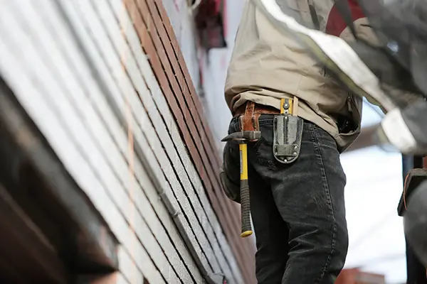 builder with tool belt