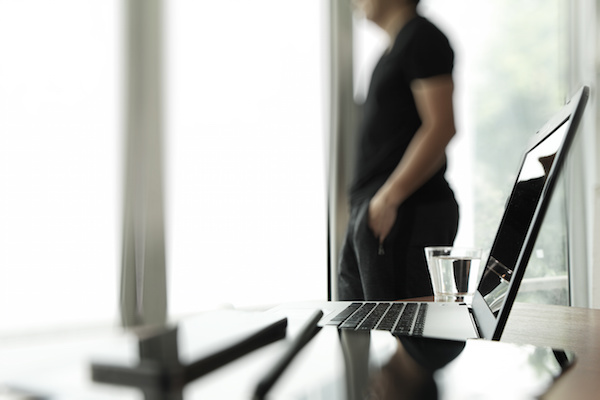 Young creative designer man working at office as concept
